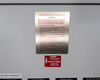 Transfer sequence instruction label and danger warning placard on inside of cabinet door