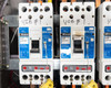 Close-up of UIB #1 breakers – two Cutler-Hammer JDB 35k 200A 3-pole units labeled UPS Input Breaker 1