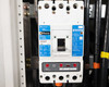 Cutler-Hammer HKD 65k breaker interior mount view showing black wiring and bus bar connections