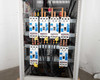 Transfer switch interior panel showing seven Cutler-Hammer HKD breakers mounted in two rows with bus bar wiring
