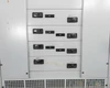 Siemens switchboard front door – breaker section exterior showing labeled branch breaker positions with toggle-style breaker handles visible through door