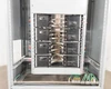 Siemens switchboard branch breaker section – interior view showing multiple bolt-on branch circuit breakers wired with green ground conductors