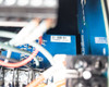 Lenze AC Tech ESV552N04TMC internal board close-up — blue PCB with barcode label reading 7140605 13442085 visible on board assembly