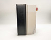 Lenze AC Tech ESV552N04TMC left side profile — black anodized aluminum heatsink fins and cream enclosure body with red rotary disconnect switch visible at top