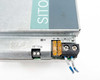 Siemens SITOP UPS1100 — closeup of terminal area showing X2 two-pin block, F1/F2 blade fuse holders, X1 screw terminals, OK status LED, and blue leads