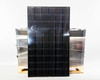 LG LG370M1K-A6 NeON 2 Black 370W AC solar panel standing upright showing full black front face with 60-cell monocrystalline surface, pallet of additional panels visible behind