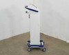 Pollogen Legend+ right side view – full height profile showing tower and mobile cart with locking casters