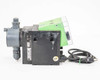 Grundfos Alldos DDA 12-10 dosing pump – right rear three-quarter view showing Digital Dosing label sticker, green back panel, and liquid end fittings