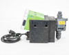 Grundfos Alldos DDA 12-10 dosing pump – left side view showing motor housing, power cord entry, and liquid end assembly