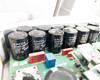 SMA Sunny Boy SB 3800-US-10 — close-up of EPCOS B43601-S977 770µF 400V electrolytic capacitor bank and WIMA MKS4 0.33µF 630V film capacitors on main PCB