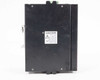 Red Lion SLX-16MS-1 — back panel with caution heatsink warning label and DIN-rail mounting bracket visible
