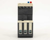 Eaton XTOE1P6BCS – rear view showing three load-side terminal openings (2T1, 4T2, 6T3) and blue/red Reset and Trip indicator buttons on top