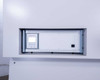 proUmid MHG Modular Humidity Generator unit installed in lower cabinet bay — front panel view