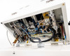 Fuji VG-400C-10W internal view with top panel open — pneumatic cylinders, wiring harness, tubing, and solenoid valves visible inside sealing head