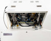 Fuji VG-400C-10W internal view with lid open — complete view of pneumatic actuators, blue and black wiring, solenoid block, and sealing mechanism components