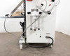 Fuji VG-400C-10W lower cabinet right side view — transparent pneumatic filter/regulator assembly and grounding cable visible