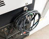 Thermo Fisher Isotemp C90-10D34 rear lower left corner – power cord coiled and secured with cable clip, compressor grille visible