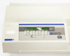 SpectraMax 250 front panel close-up showing illuminated green LCD screen displaying CALIBRATING readout and full keypad layout