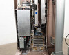Lumenis AcuPulse 40 AES-A – interior side view showing internal chassis with power electronics, cooling coils, fluid lines, and wiring