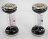 Bacharach Fyrite tester pair — both CO2 and O2 Fyrite testers side by side showing graduated clear tubes with 0–20 scale markings and chrome and black housings
