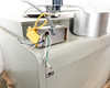 Modine PD400AA0181 – top rear corner close-up showing control/ignition box with yellow dust cap, wiring, and flue collar