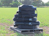 Toro Blueline 4-inch oval drip irrigation hose lot on wooden pallet with visible emitter fittings and tie straps