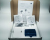 Zeiss Axiocam 202 mono camera and accessories packed in original open retail box with foam insert, showing 2 software discs, cables, and camera