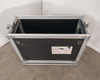 Tour Supply ATA road case open interior view showing 4U rack rails, black laminate interior walls, steel ball corners, and band logo sticker