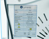 Lumenis NuEra Tight APMD130 specification label showing 470 kHz emission, 250W output, 110V AC 60Hz
