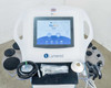 Lumenis NuEra Tight APMD130 RF skin tightening system – front view with touchscreen display showing home screen and accessories on tray