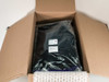One Cytiva Xuri Cellbag in black light-sensitive outer bag packed inside an open cardboard shipping box with bubble wrap