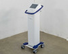 Pollogen Legend+ by Lumenis three-quarter front view on mobile cart showing touch screen and handle