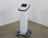 Pollogen Legend+ full unit front view on mobile cart with casters — white and blue housing