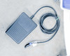 Pollogen Legend+ foot pedal with long cable and proprietary connector — accessory included with unit