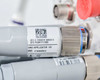 Close-up of Pollogen Legend+ SMD Applicator VO label showing REF 21400800U and barcode — PLVA1711483 serial