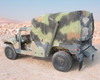 AM General M1152 HMMWV rear three-quarter view showing full soft top cargo enclosure and rear step bumper