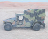 AM General M1152 HMMWV full left-side profile view in desert environment showing soft top and overall condition