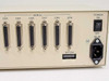Buffalo Printer Buffer SL – close-up of 6 serial DB25 female connectors labeled CH4–CH9 with DIP switch bank and IEC AC power inlet