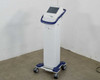 Pollogen Legend+ full unit front view on wheeled mobile cart against white wall
