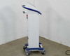 Pollogen Legend+ right-side view on mobile cart with wheeled base, power cord visible
