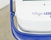 Close-up of Pollogen Legend+ lower left corner showing cracked and damaged plastic casing near blue handle base