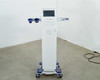 Pollogen Legend+ RF system front view showing touchscreen display and dual applicator arm holders