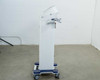 Pollogen Legend+ left-side profile view showing articulating applicator arm bracket
