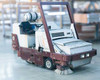 PowerBoss TSS/90-HD-HC rideable sweeper scrubber — left front three-quarter view showing side brush, ROPS frame, and overall machine condition