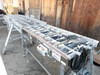 Single Excel Flow SC23460 conveyor section outdoors showing full length – label reads 'Seeder Comp Co CV, SC23460 CV1X'