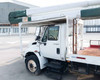 2012 International 4400 Durastar cab driver-side profile – Durastar badge, step, and cab guard detail