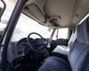 Interior cab view – bench seat, steering wheel, and dashboard of 2012 International 4400 Durastar bucket truck