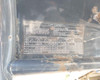 John Deere 35G lift capacity chart sticker on cab interior — shows load ratings with and without dozer blade
