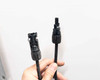 MC4-style solar panel output cable connectors – positive and negative leads shown side by side