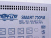 Tripp-Lite Smart 700RM SM3207 label closeup — INPUT 120V 60Hz 500W/750VA, OUTPUT 120V 60Hz 450W/700VA